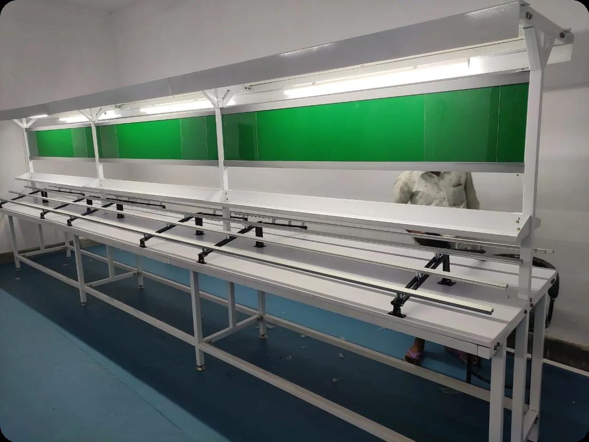 Manual insertion conveyor line at the Paripath Technologies facility